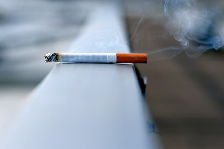 white-cigarette-stick-on-white-wall-smoking